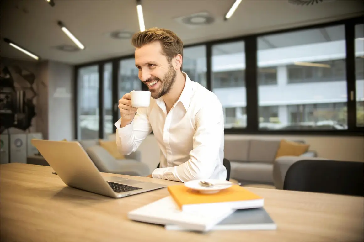 happy man laptop